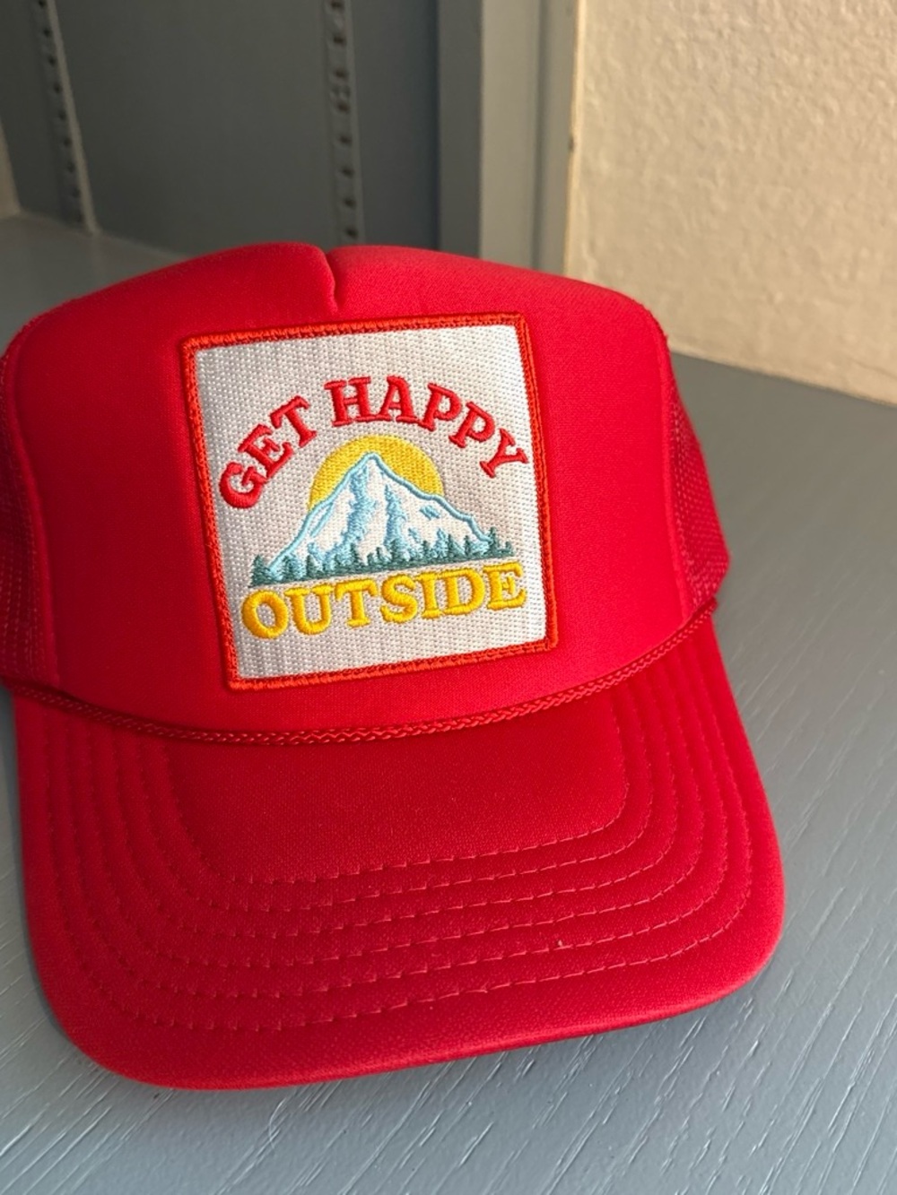 Brand new Red "Get Happy Outside" Trucker Hat